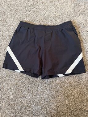 Curry-Under Armour Black Athletic Shorts with White Stripe Accents
